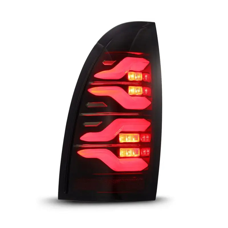 AlphaRex 05-15 Toyota Tacoma LUXX LED Taillights Blk/Red w/Activ Light/Seq Signal arx680070