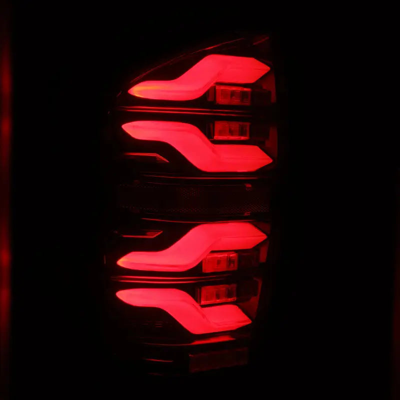 AlphaRex 16-21 Toyota Tacoma LUXX LED Taillights Blk/Red w/Activ Light/Seq Signal arx680000