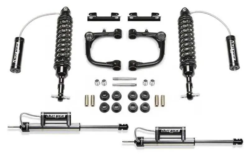 Fabtech 15-19 Toyota Tacoma 2WD/4WD 3in UCA System w/DL 2.5 Resi Coilovers & Rear DL Resi Shocks K7057DL